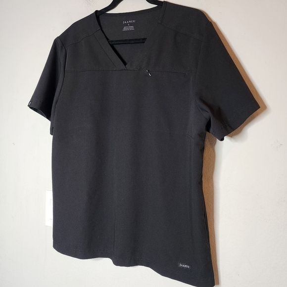 Jaanuu black scrub top. 1 zip chest pocket.  Short sleeve v-neck. Women's size L - Picture 11 of 14